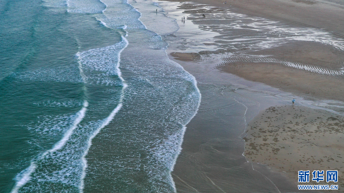 “飞阅”中国｜平潭：最美金沙滩 踏浪逐日落-新华网(图10)